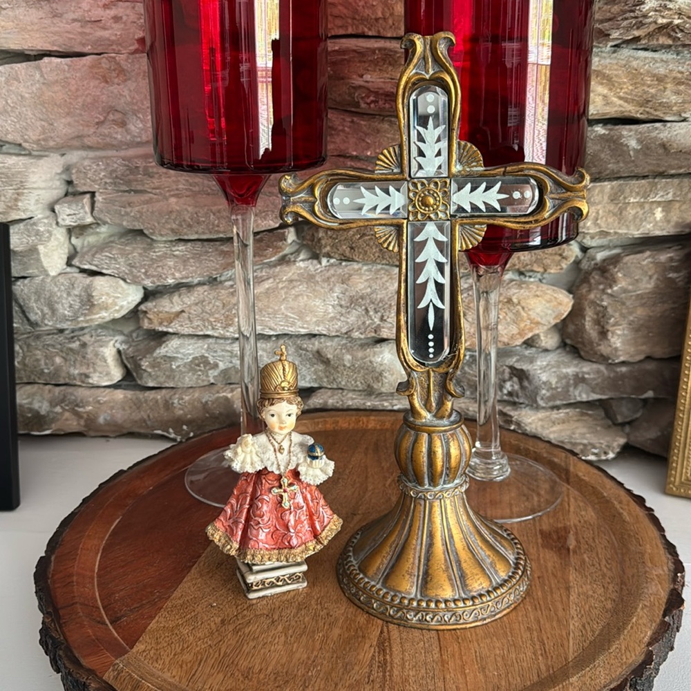 Infant of Prague statue and gilded cross with beveled frosted mirror accents